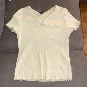 Light green top with ruffles